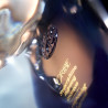Шампунь для блиску волосся Oribe Supershine Hydrating Shampoo з орхідеєю, білим чаєм та шовком 250 мл — має розкішний аромат —