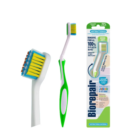 Дитяча зубна щітка 6-12 років Biorepair Medium Soft Jun — з антибактеріальним покриттям, унікальним вигином, захищає емалі та