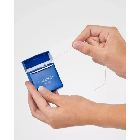 Зубна нитка DF 850 для щоденного використання з ароматом мяти Curaprox Daily Dental Floss 50m — вигляд товару