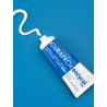 Професійна зубна паста Curaprox Enzycal 950 75ml — з фтором, ферментами, захист від карієсу, для дітей з 6 років — аплікація
