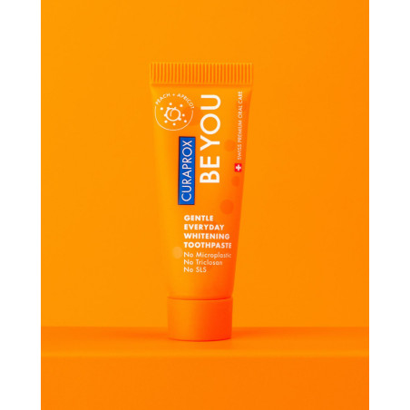 Відбілююча зубна паста Curaprox Be You Peach 10ml — зі смаком персика, фтором, ферментами, для здоров'я ясен — вигляд товару