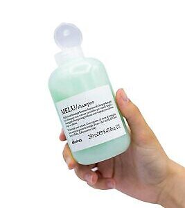 Шампунь проти ламкості для блиску пошкодженого та довгого волосся з екстрактом насіння сочевиці, серином і глютаміновою кислотою Davines MELU Shampoo 250ml